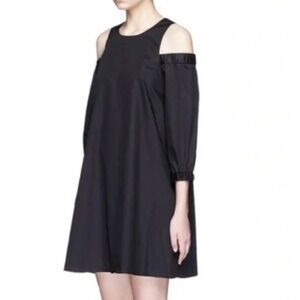 Tibi size 12 Elegant Black scoop Neck Top with cold shoulder sleeves